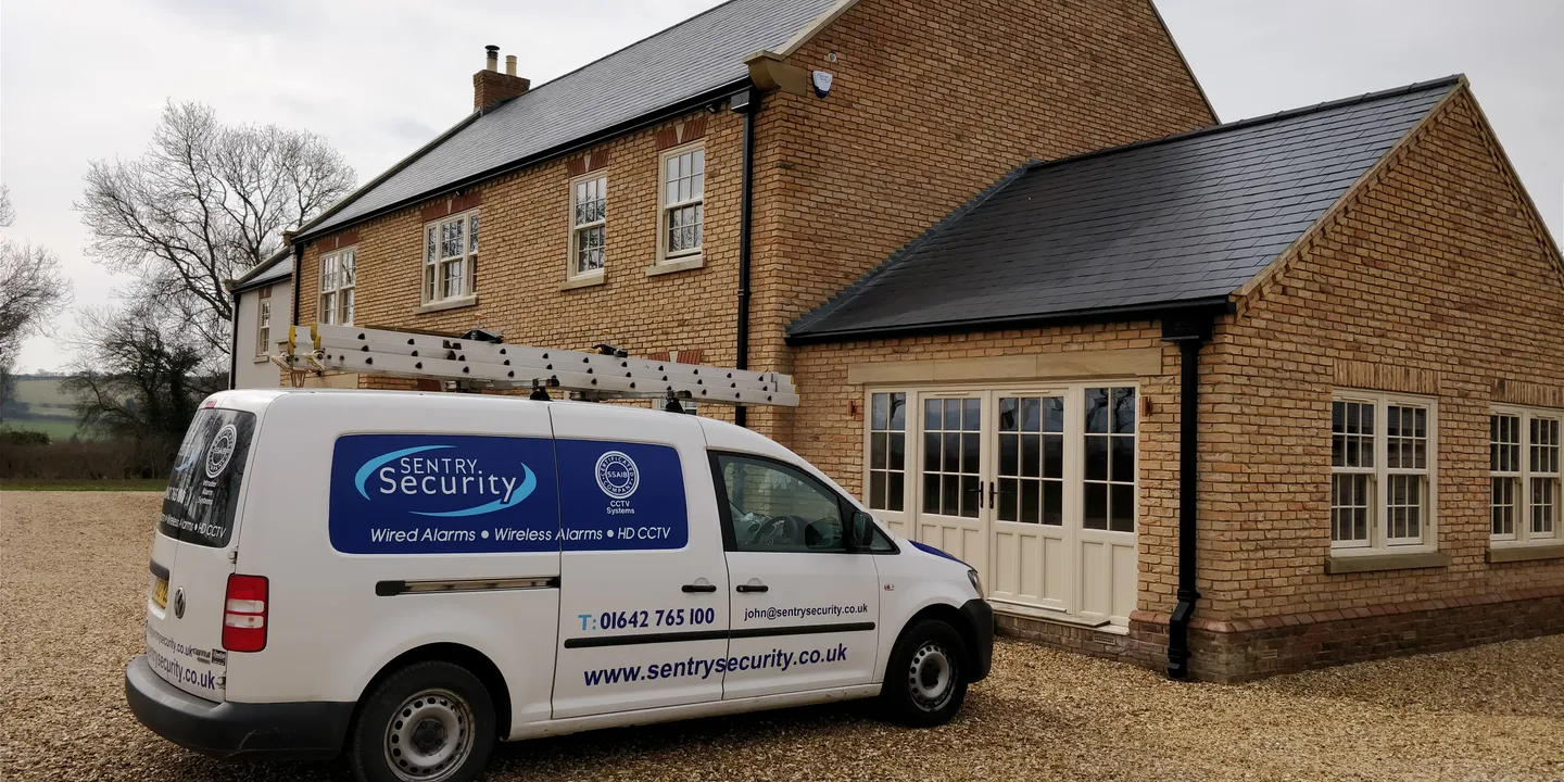 Sentry Security van outside a customer's property
